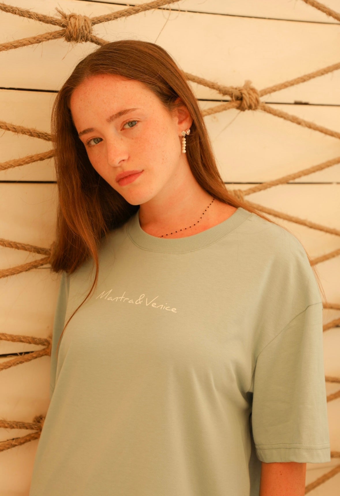 Light blue T